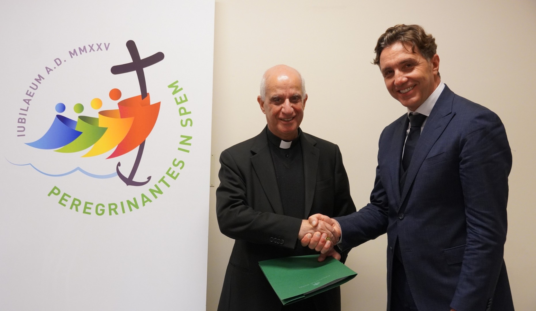 S.E. Mons Fisichella con Stefano Stoppani, Country Manager Visa Italia